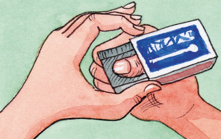 Verrückte Daumen Daumen durch Schachtelloch schieben