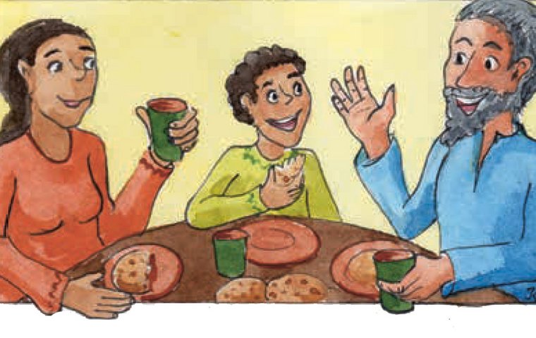 Elia, Frau und Kind sitzen am Tisch und essen und trinken fröhlich miteinander.
