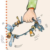 Hand mit Metallring mit Schlüsseln