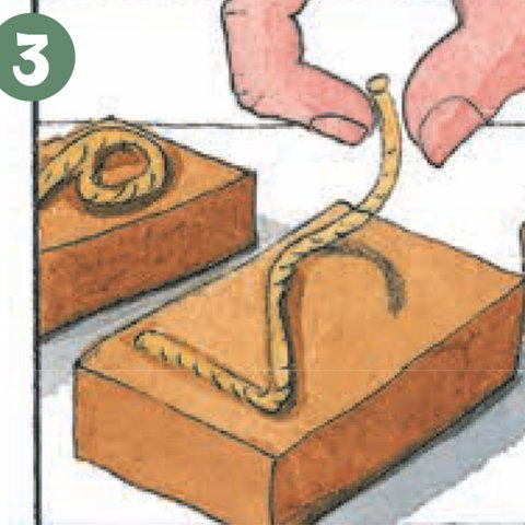 2 aus Schnur aus Holzklötzchen legen.