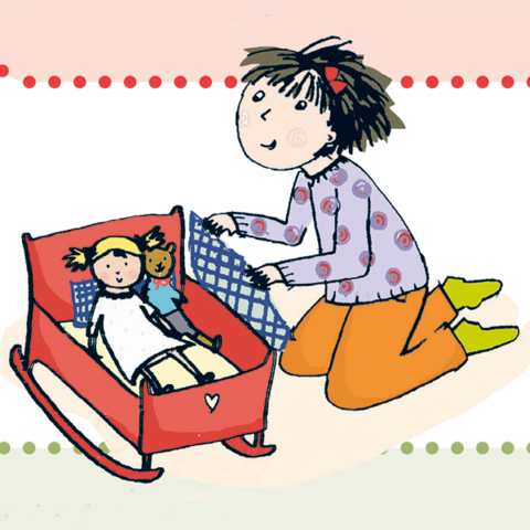 Kind mit Puppe und Teddy in Puppenwiege