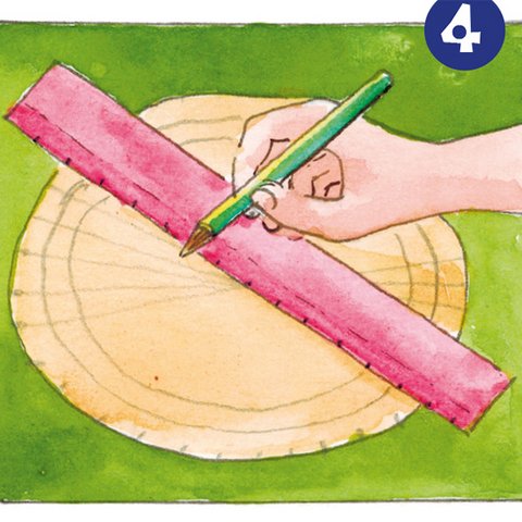 Mit Lineal und Stift Linien auf Papierkreis ziehen.