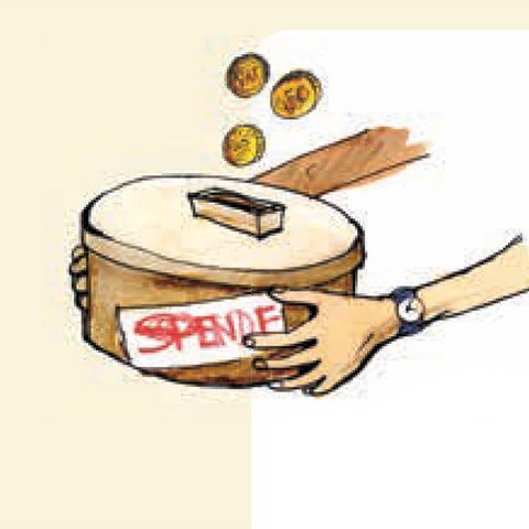 Braune Spendenbox mit Aufschrift SPENDE