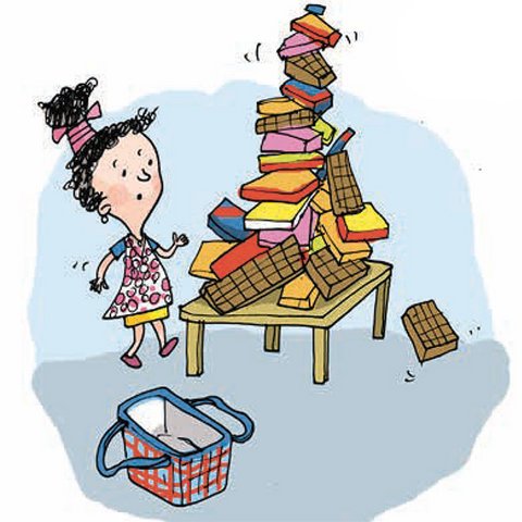 Mädchen vor Tisch mit Schokoladen-Stapel und leerer Tasche